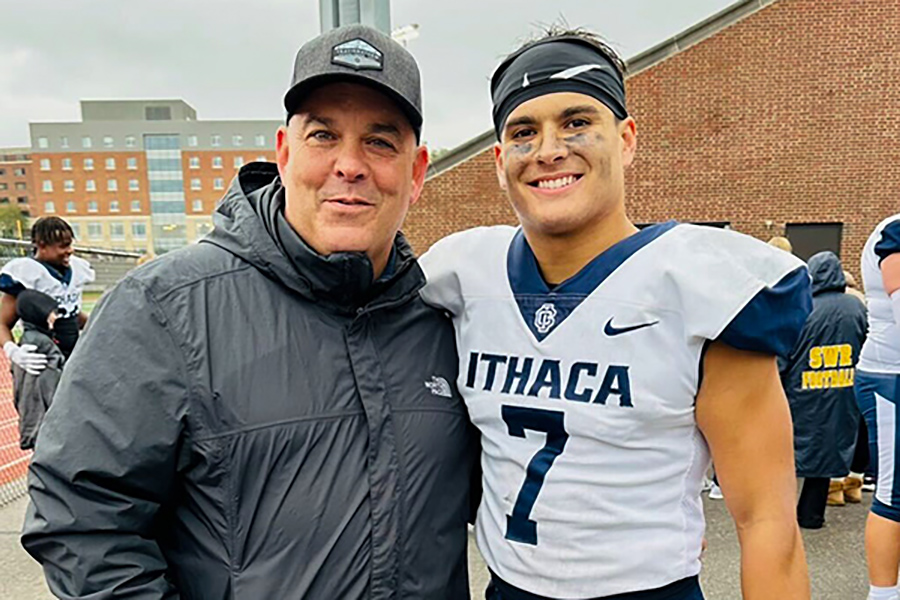 Father Scott (left) and son Jake (right) come together after a football game at the University of Rochester. 