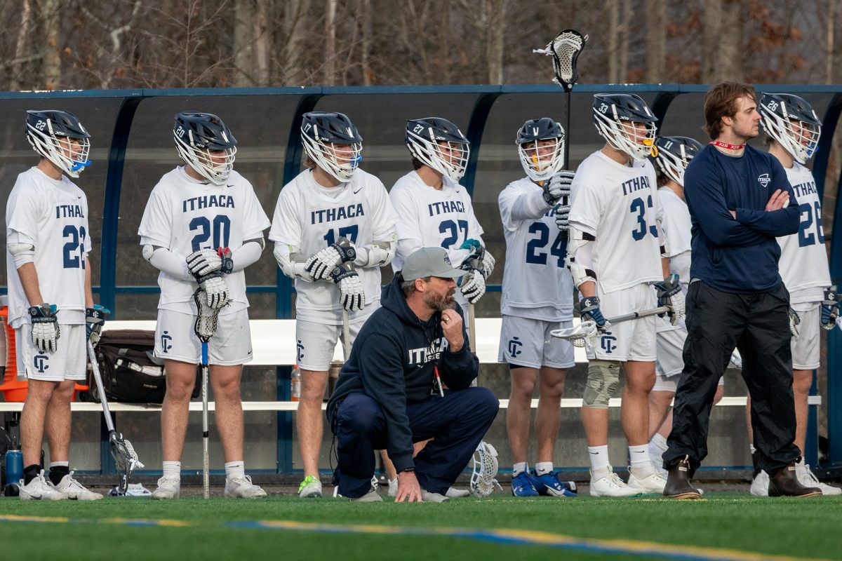 The Ithaca College men's lacrosse team won its first game of the 2025 season at Higgins Stadium Feb. 26. The coaches and the players follow the action from the sideline.