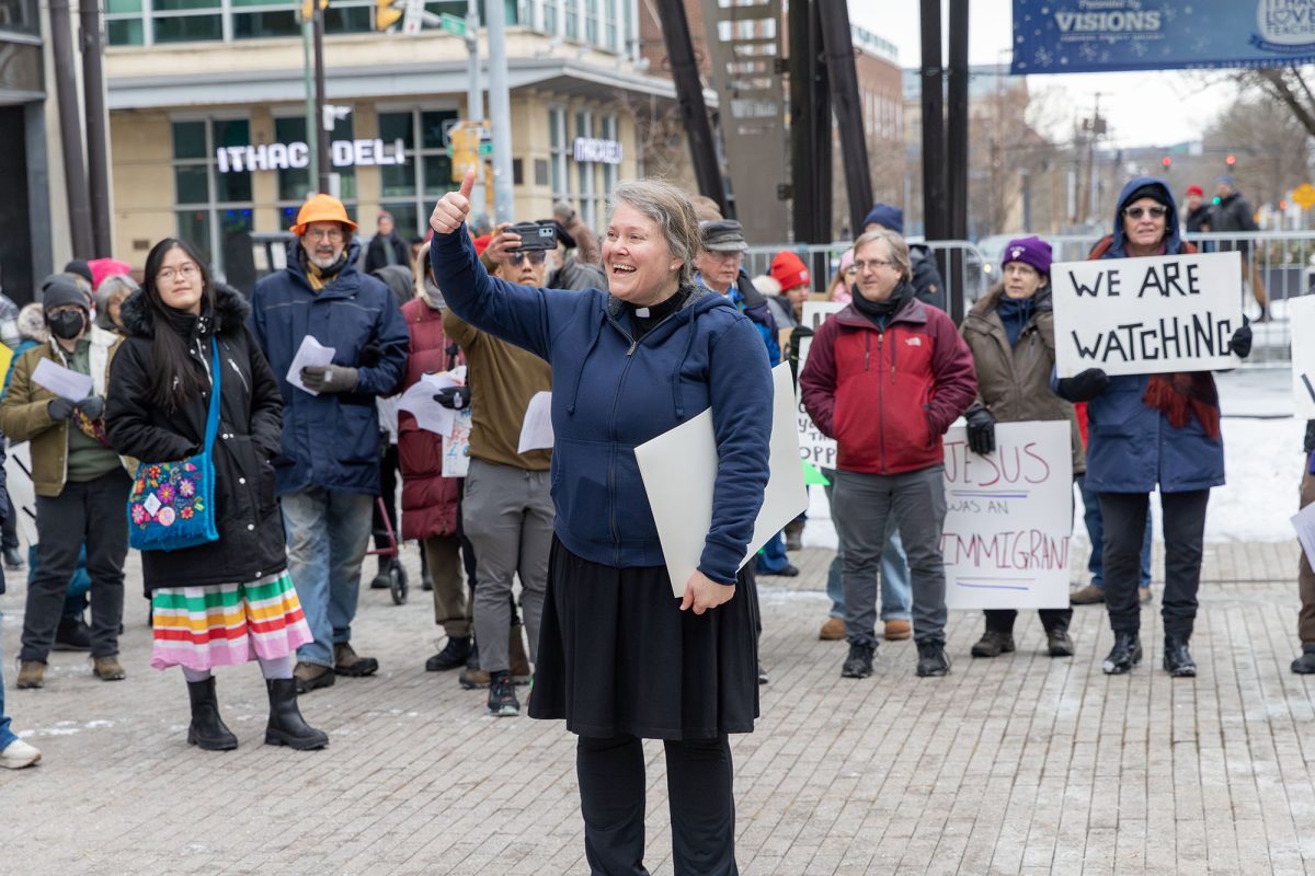 Rev. Kirianne Weaver, senior pastor of the First Presbyterian Church of Ithaca, led the group in song and chant. She encouraged protestors to shout the phrases that were written on their signs and chanted “No justice, no peace.” 