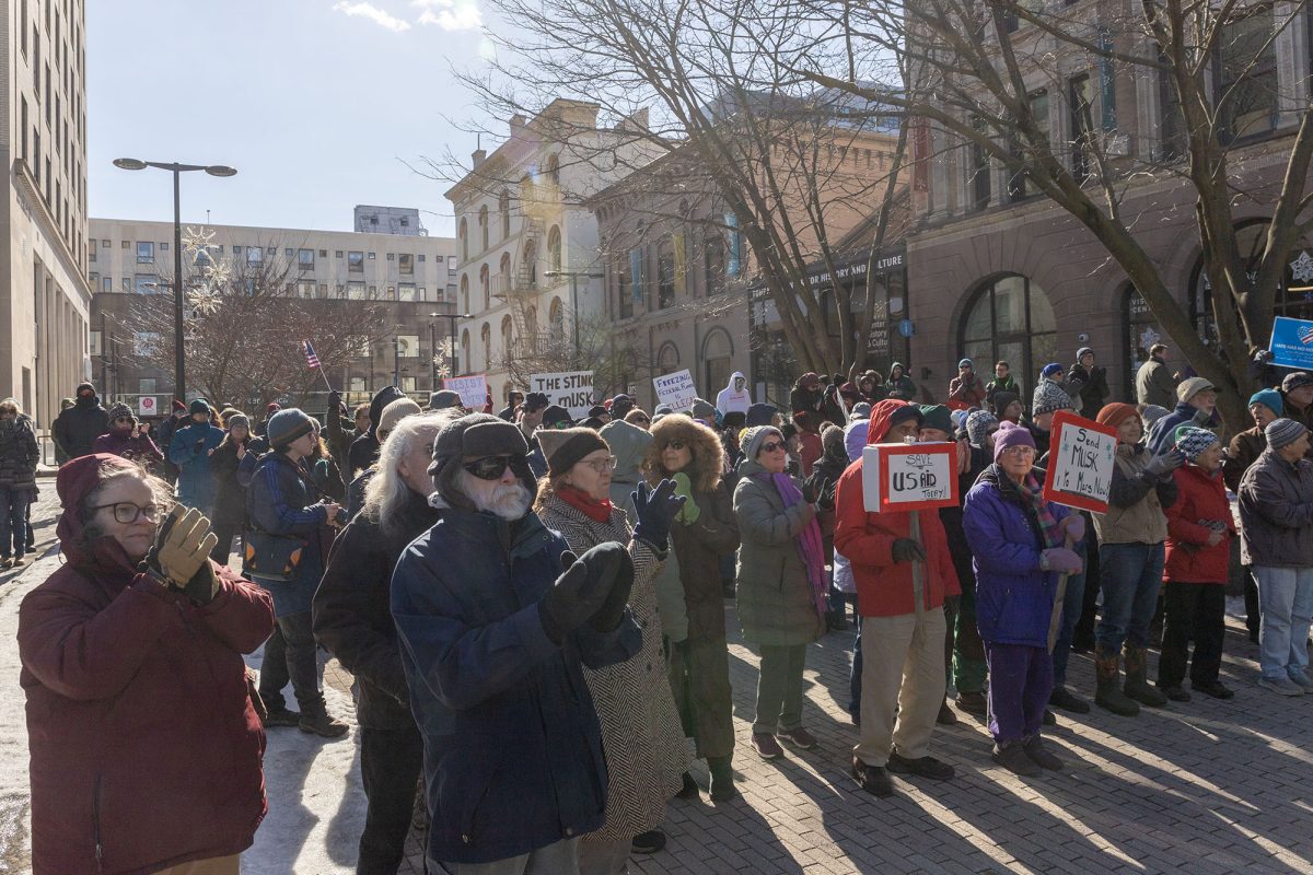 Ithaca community members gather on The Commons to protest the presence of ICE in Ithaca. 