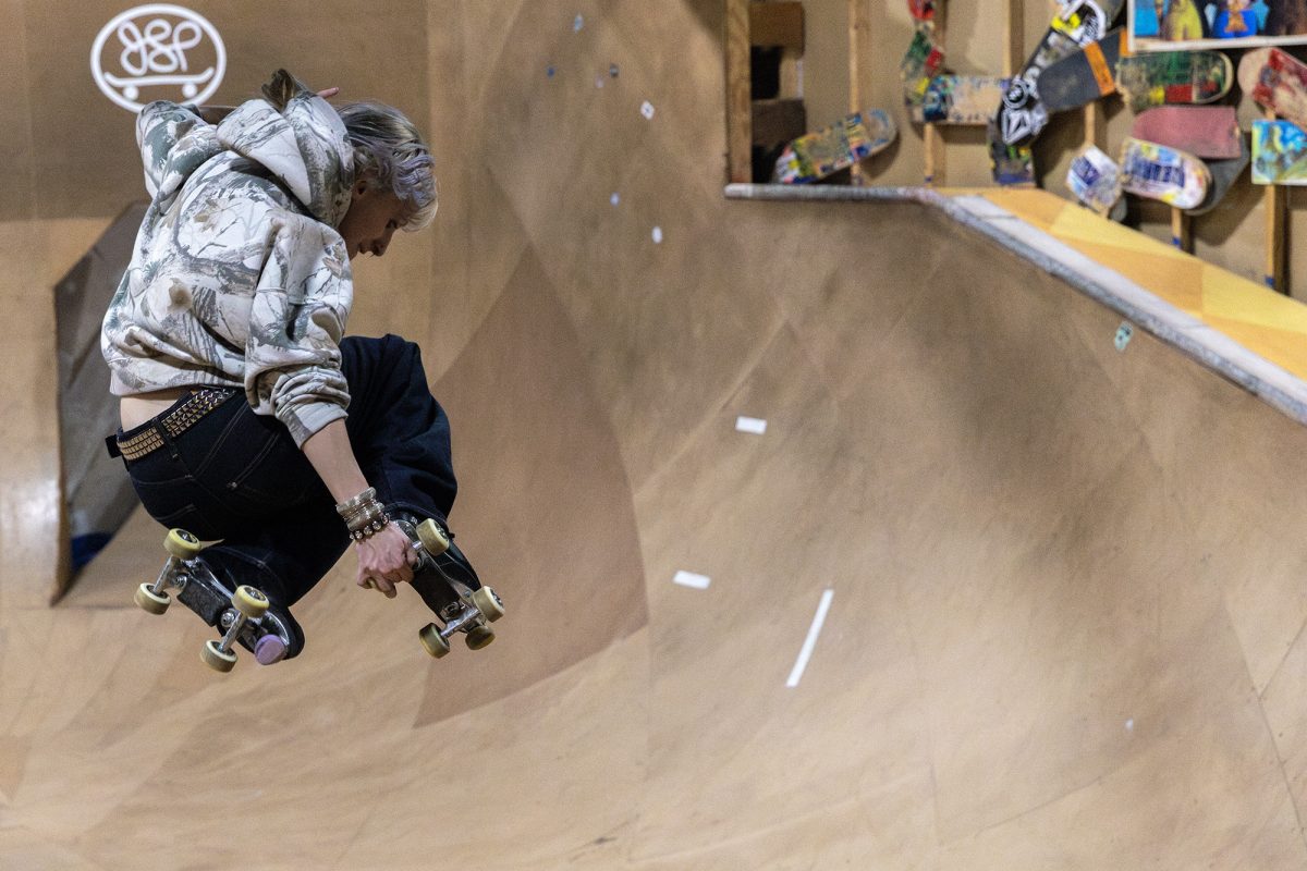 Sam Schulz, Rust Cup 2025 competitor, flies over the bowl while hitting a trick.