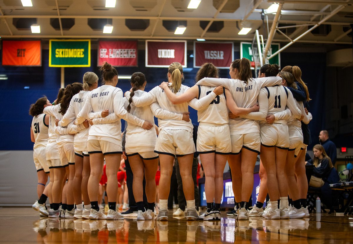 The Ithaca College women's basketball team swept its weekend schedule at Ben Light Gymnasium, taking down the RPI Engineers Feb. 8. Pictured, the team huddles before tipoff.