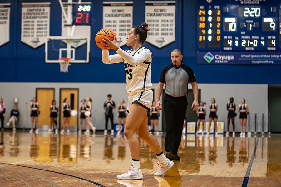 The Ithaca College women's basketball team defeated the William Smith Herons in another Liberty League matchup Jan. 31. Pictured, first-year guard Madison Gill takes the ball behind the three-point line.