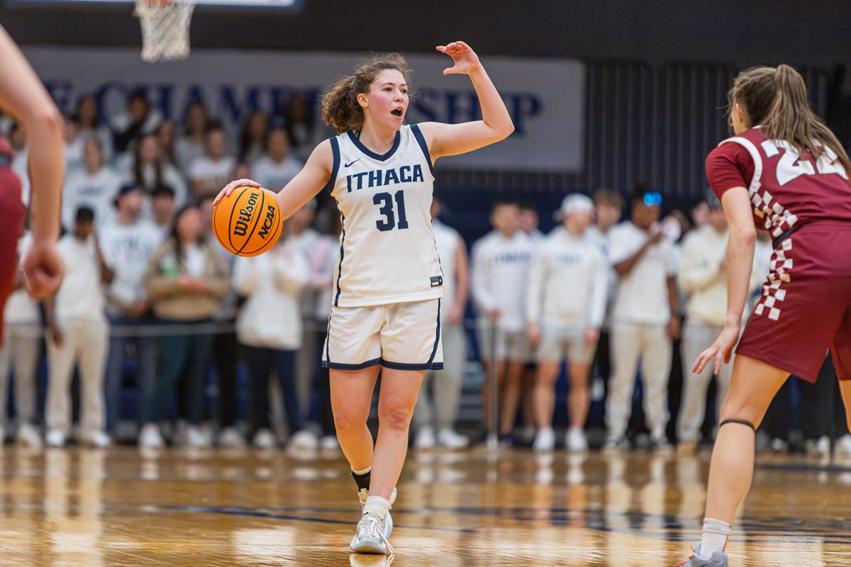 The Ithaca College women's basektball team advanced to the Liberty League Championship with a win over the Rochester Institute of Technology Tigers Feb. 28. Junior guard Zoraida Icabalceta calls the play from center court.