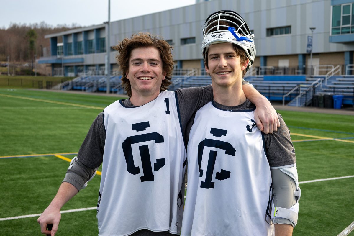 From left, senior attacker Kyle Proctor and his younger brother, sophomore midfielder/attacker Lucas Proctor, are leading the charge for the IC men's lacrosse team. Kyle's leading the team in assists with 24 and Lucas is leading the team in goals with 28.