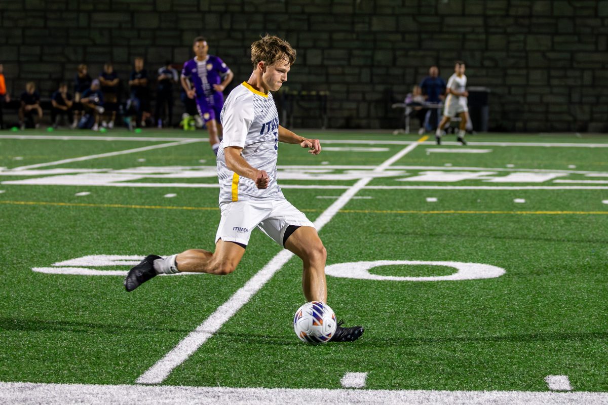 Senior midfielder Drew Warren faces down the Elmira College Eagles' defense in a 3-0 shutout on Sept. 3.