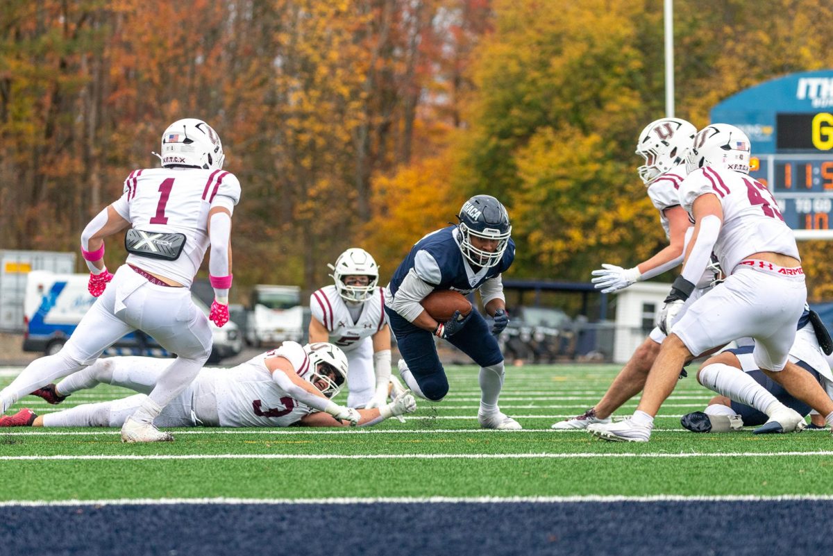 Sophomore wide receiver Tian Murray bursts through the Garnet Chargers defense in a 19-14 defeat on Oct. 25.