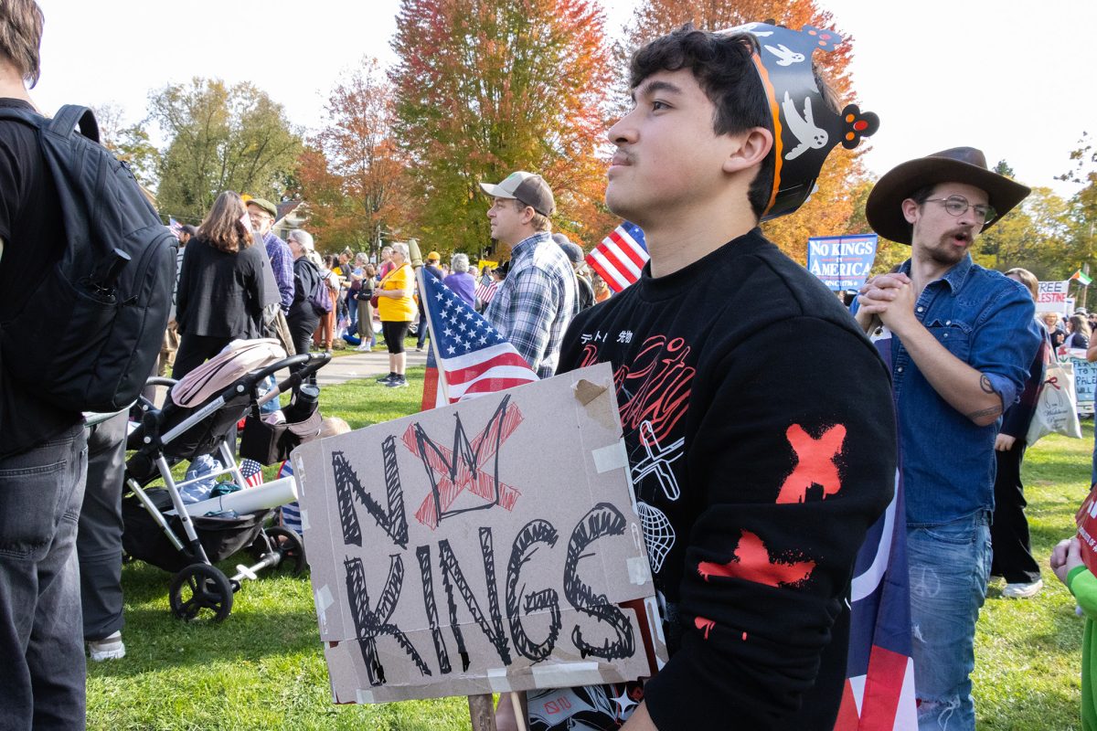 Junior Dakota Tseng protesting President Donald Trump's alleged king-like rule with a Burger King crown. 