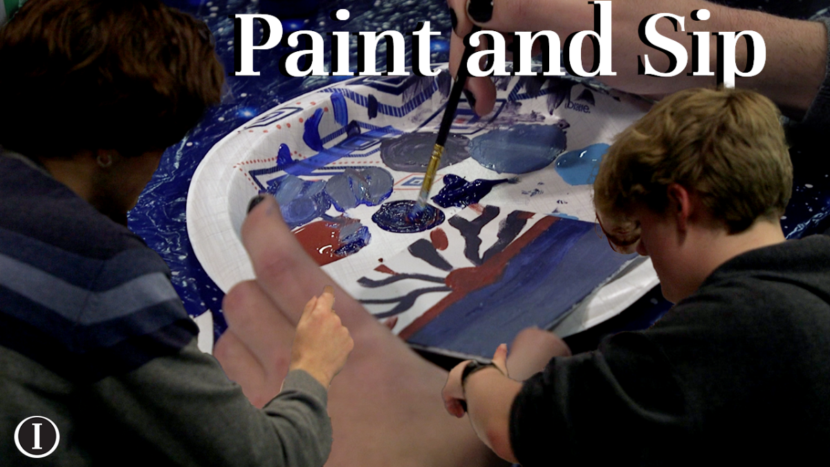 Students have colorful conversations at Paint and Sip
