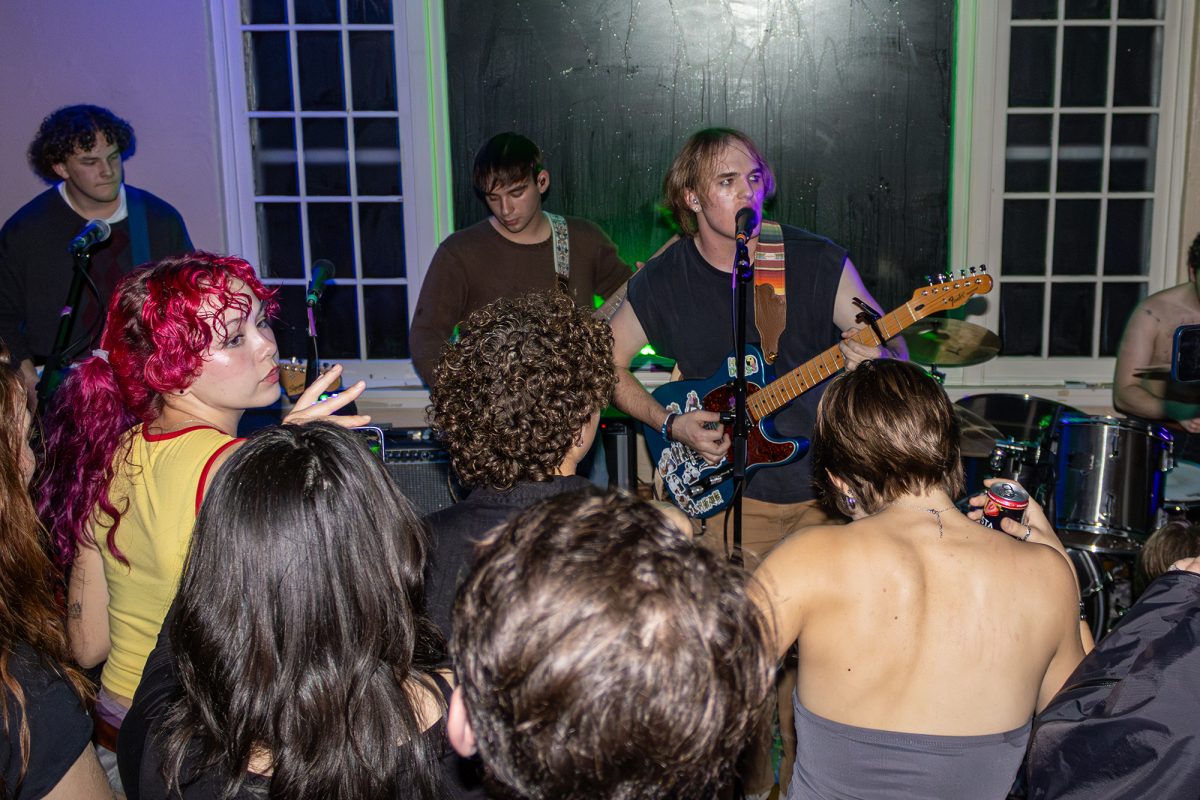 Student band 'awdam,' made up of juniors Alex Siegelson, Dan Boush, Wade Messier and Sam Nejberger, plays a house show on the eve of their extended play release "You Win!"