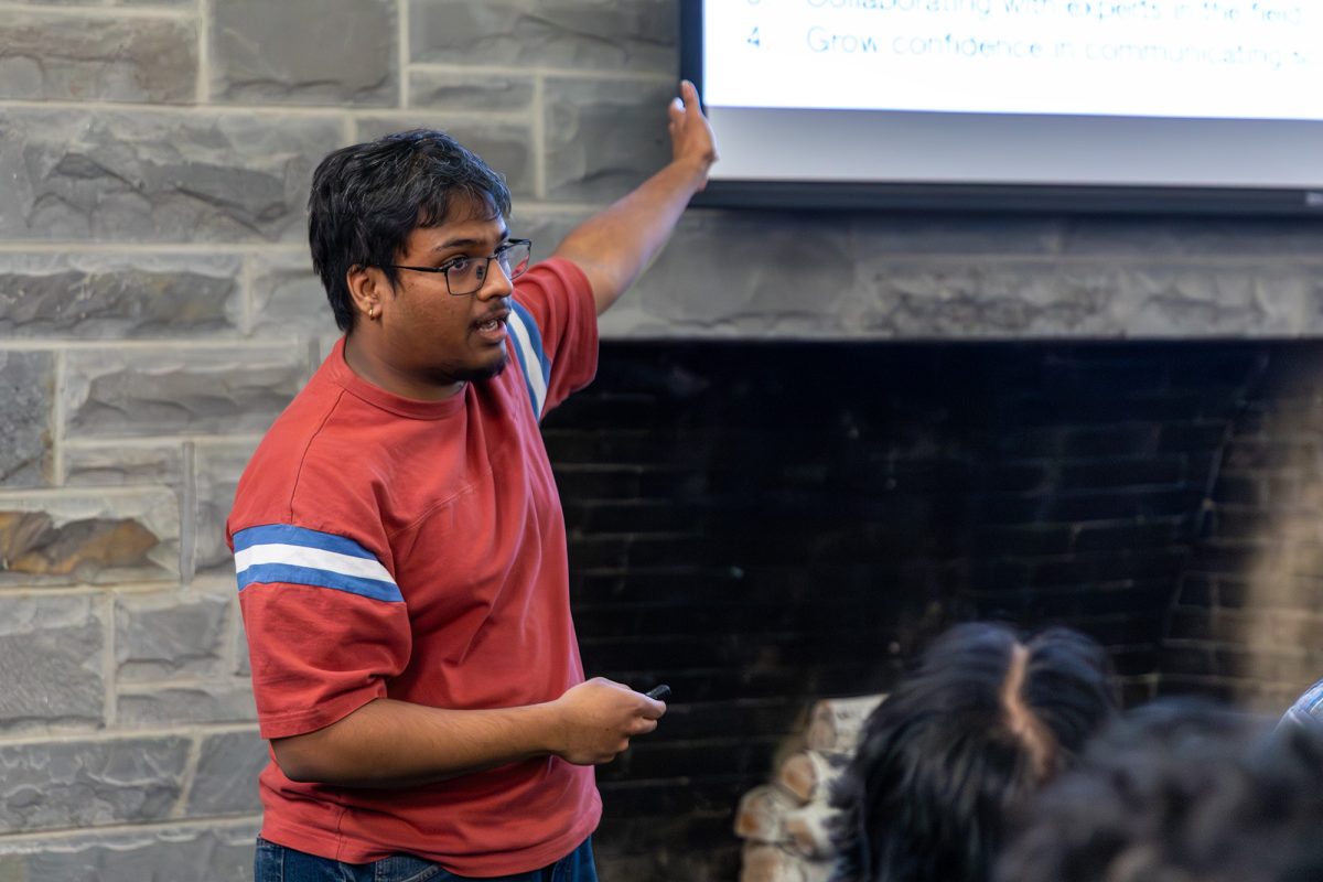 Senior Rishabh Sen, the student body president and the president of the Ithaca College Chemistry Club, presents an appeal to SGC after the club's budget for its annual Research Symposium was denied.