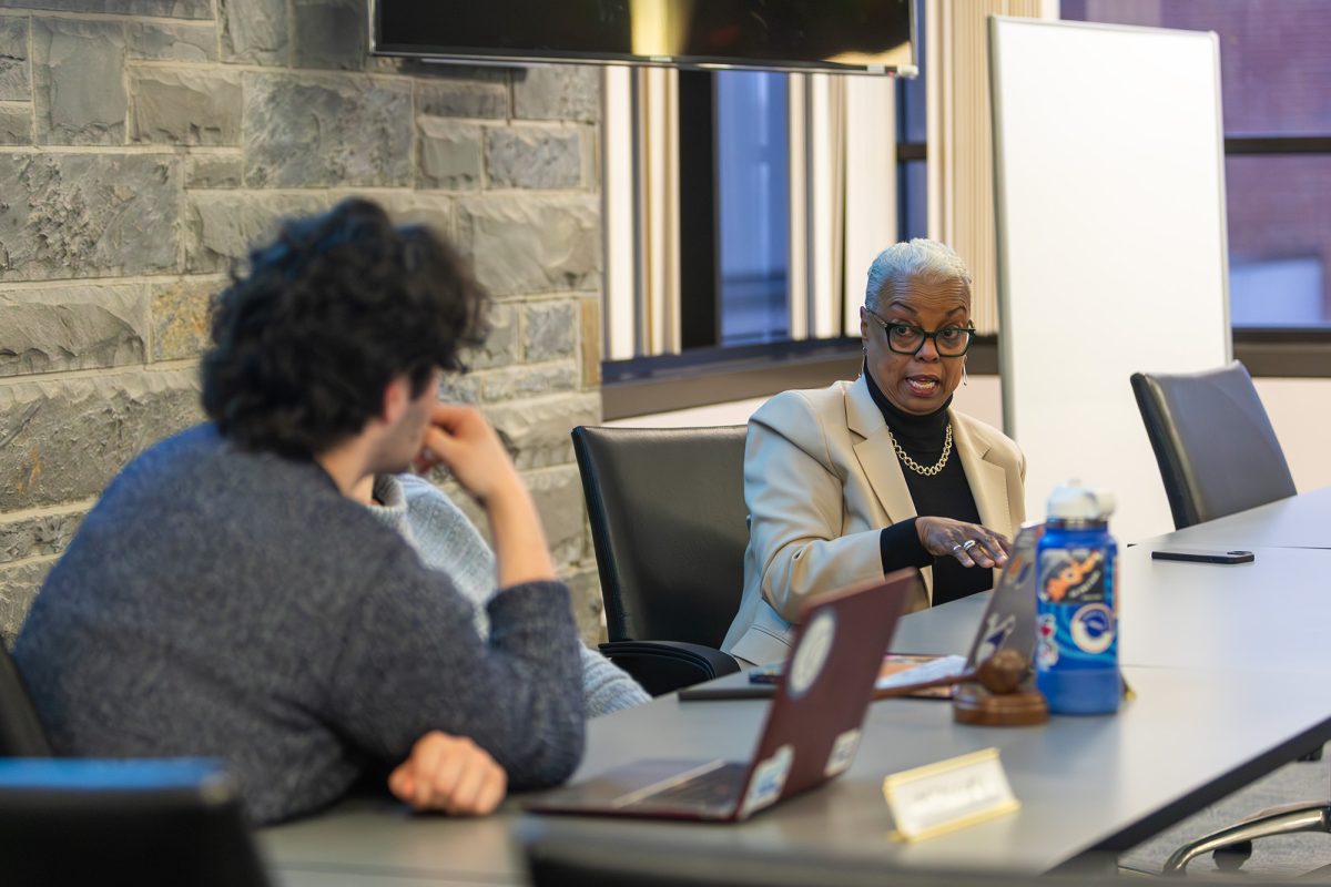 President Cornish addresses a question from first-year student Ari Medvinsky, School of Humanities and Sciences senator, at the March 23 SGC meeting.