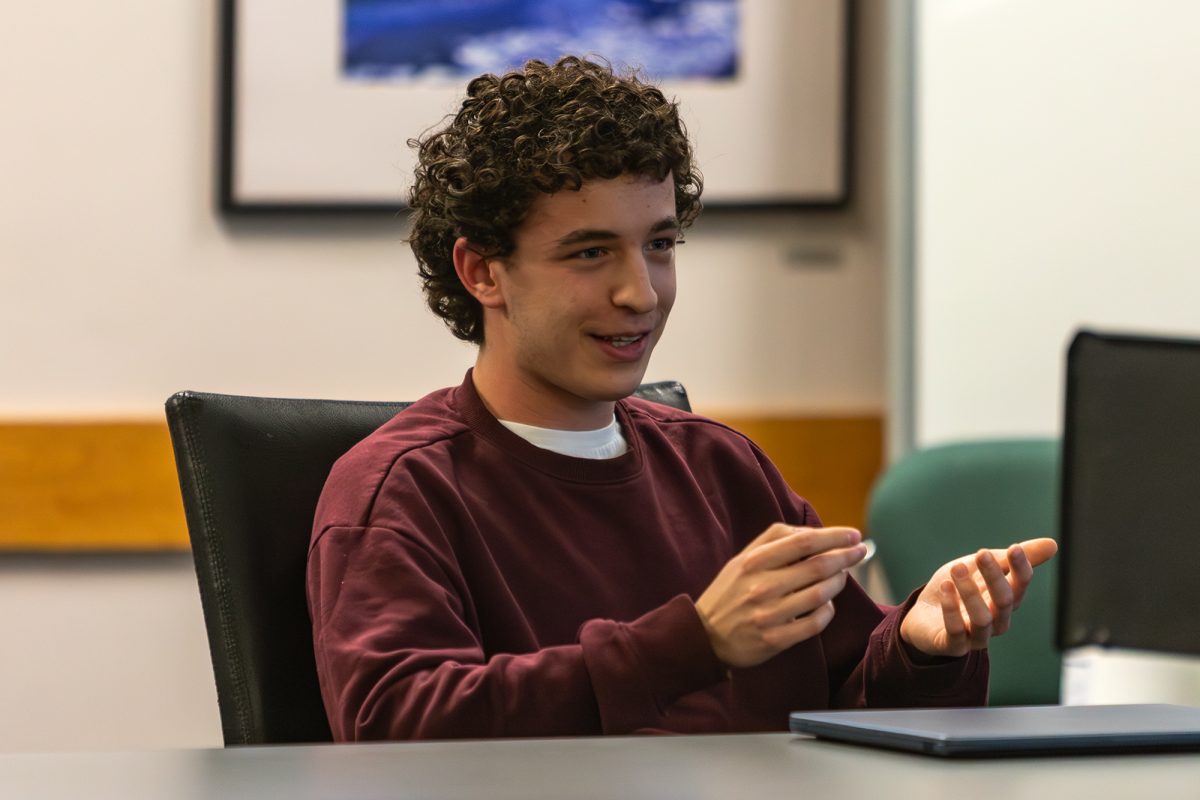 Sophomore Nick Petrillo presents to the council on why he would like to be a senator on SGC. The senate confirmed Petrillo as a senator-at-large later in the meeting. 