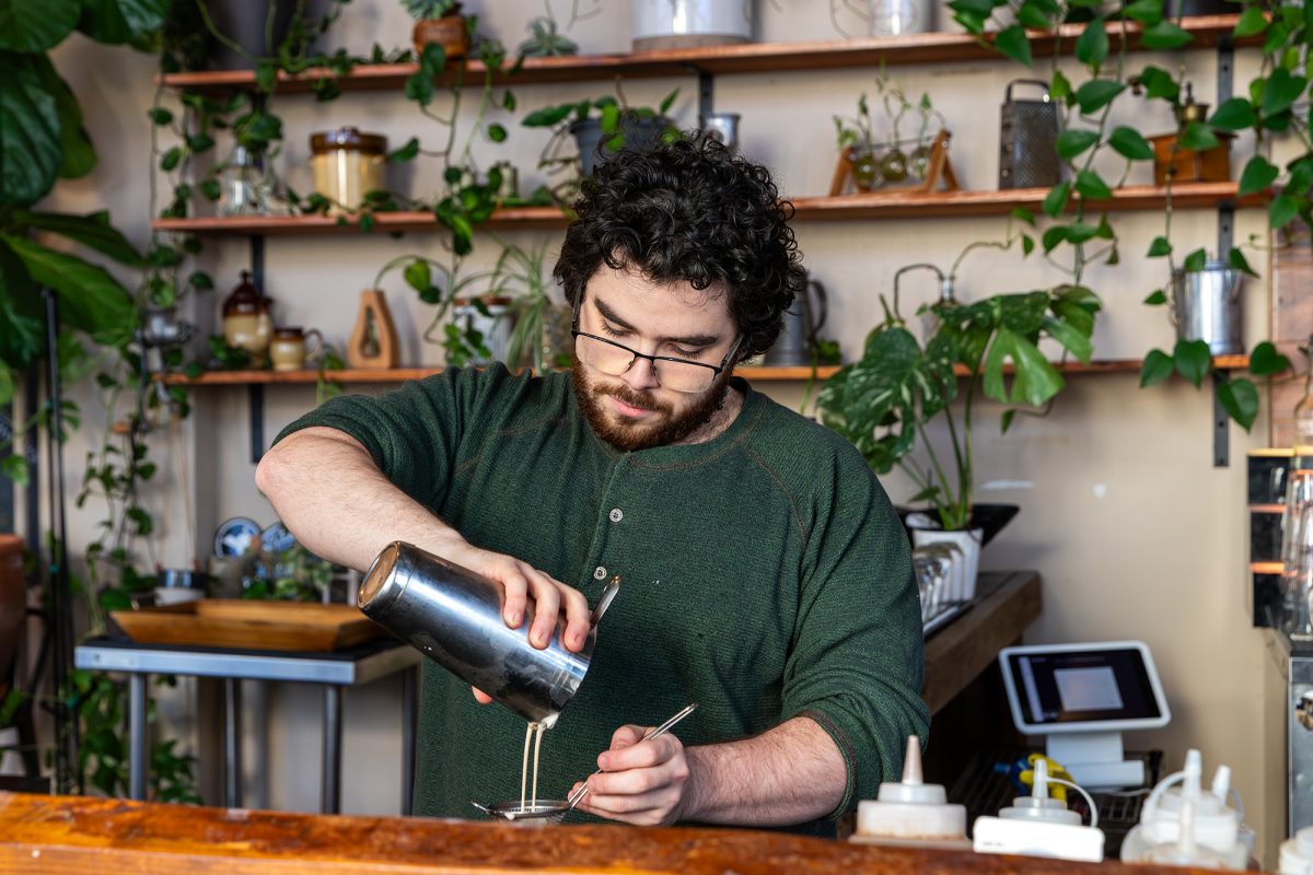 Yair Assayag '25 creates a special beverage each week for The Greenhouse Cafe and Cocktail Lounge customers, like the matcha martini.
