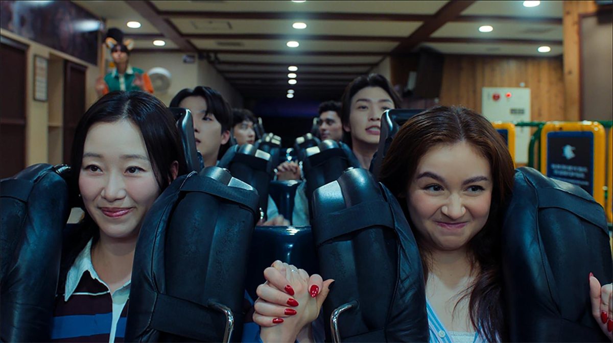 From left, Yuri (Gia Kim) and Kitty (Anna Cathcart) riding a roller coaster in Season 3 of "XO Kitty."